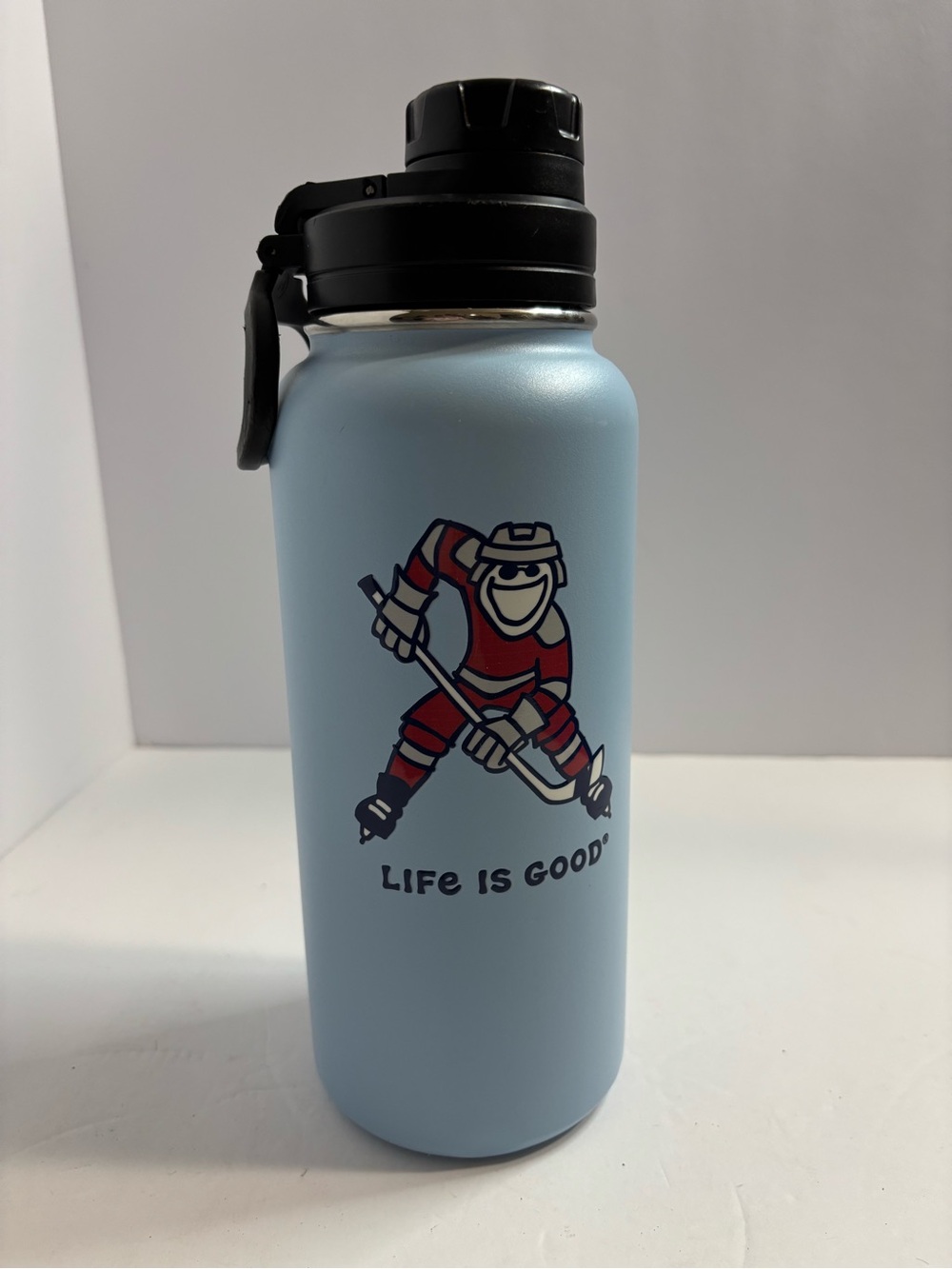 Life is Good stainless steel water bottle features hockey player Has Small Flaw